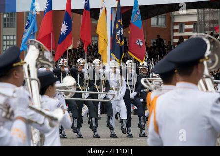 Taipei, Taiwan. 10th Oct, 2023. Taiwanese honour guards flanked by a military band march during Taiwan National Day, also called Double Ten, in downtown Taipei on October 10, 2023. Credit: ZUMA Press, Inc./Alamy Live News Stock Photo