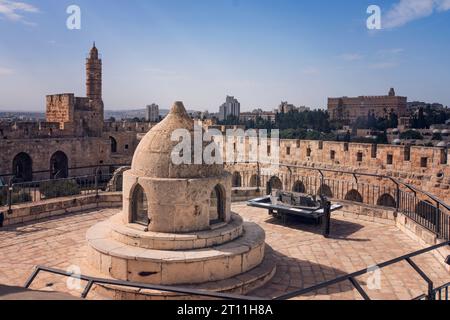 Panaramic view to the stone dome of the the Church of Holy Sepulchre at the Tower of David background. JERUSALEM, ISRAEL Stock Photo