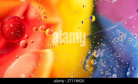 Fantastic structure of colorful oil bubbles. Chaotic motion. Abstract paint. Flat lay. Movement of bubbles in the liquid. Water surface multicolored b Stock Photo