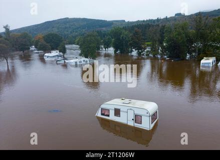 Aerial views from drone of Aberfeldy Caravan Park is flooded by the River Tay which broke its banks after torrential rainfall in October 2023. Aberfel Stock Photo