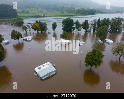 Aerial views from drone of Aberfeldy Caravan Park is flooded by the River Tay which broke its banks after torrential rainfall in October 2023. Aberfel Stock Photo