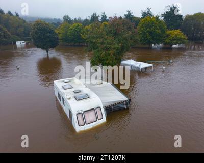 Aerial views from drone of Aberfeldy Caravan Park is flooded by the River Tay which broke its banks after torrential rainfall in October 2023. Aberfel Stock Photo