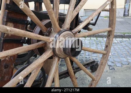 The old wheel from the cart Stock Photo