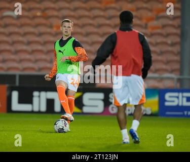 Blackpool, UK. 31st Aug, 2023. Andy Lyons #24 of Blackpool warms up before the EFL Trophy match Blackpool vs Liverpool U21 at Bloomfield Road, Blackpool, United Kingdom, 10th October 2023 (Photo by Steve Flynn/News Images) in Blackpool, United Kingdom on 8/31/2023. (Photo by Steve Flynn/News Images/Sipa USA) Credit: Sipa USA/Alamy Live News Stock Photo