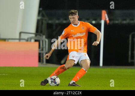 Blackpool, UK. 31st Aug, 2023. Will Squires #44 of Blackpool passes the ball during the EFL Trophy match Blackpool vs Liverpool U21 at Bloomfield Road, Blackpool, United Kingdom, 10th October 2023 (Photo by Steve Flynn/News Images) in Blackpool, United Kingdom on 8/31/2023. (Photo by Steve Flynn/News Images/Sipa USA) Credit: Sipa USA/Alamy Live News Stock Photo