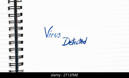 Virus detected handwriting  text on paper, on office agenda. Copy space. Stock Photo