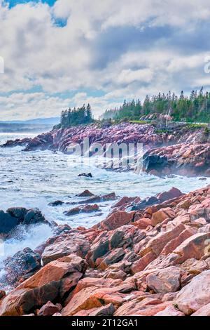 Surf pounds the rocks at Lakies Head, a popular lookout along the Cabot Trail in Nova Scotia. Stock Photo