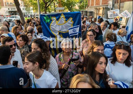 Madrid, Spain. 10th Oct, 2023. Protesters hold placards and banners during a protest in front of the Embassy of Israel in Madrid. The Israeli community in Madrid has gathered to show their support to their country and to protest against the attacks of Hamas during the Israeli-Palestinian conflict. The Palestinian militant group Hamas launched the largest surprise attack from Gaza on October 7, that prompted a declaration of war by Israeli Prime Minister Benjamin Netanyahu. Credit: Marcos del Mazo/Alamy Live News Stock Photo