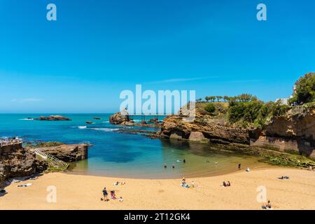 The beautiful Plage du Port Vieux on a summer afternoon where bathers can be seen bathing. Municipality of Biarritz, department of the Atlantic Stock Photo