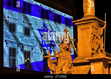 Pilsen, Czech Republic. 10th Oct, 2023. Light projection of the waving Israeli flag at the Pilsen City Hall in support of Israel, which was attacked by the radical Islamist group Hamas, in Pilsen, Czech Republic, on October 10, 2023. Credit: Miroslav Chaloupka/CTK Photo/Alamy Live News Stock Photo