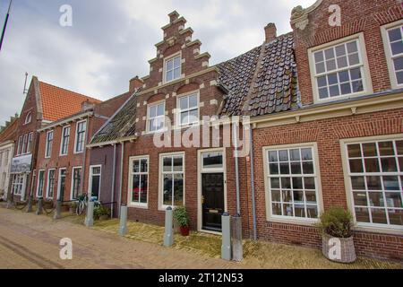 Typical old houses in the city center of harbor Harlingen, Friesland, The Netherlands Stock Photo
