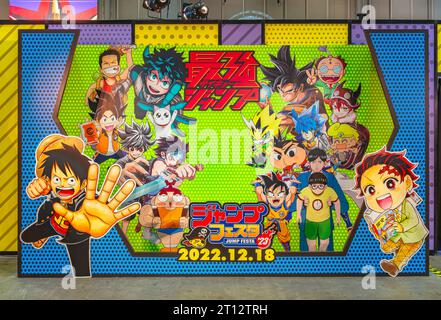 chiba, japan - dec 18 2022: Prominent cardboard display illustrated with characters from manga series like One Piece or Demon Slayer Stock Photo