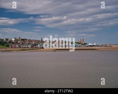 Across the River Mersey, the frontage of New Brighton - a seaside resort in Wallasey on the Wirral Peninsula, Merseyside, in the north west of England Stock Photo