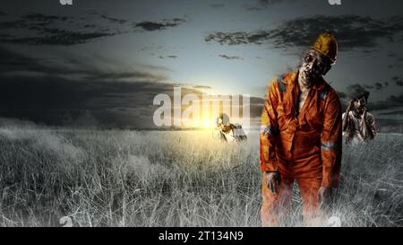 A group of scary zombies with blood and wounds on their bodies are walking on the field. Scary zombie. Halloween concept Stock Photo