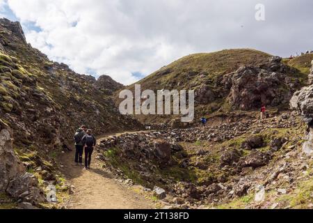Footpath, Hiking to the summit of Mt. Brennisteinsalda in Landmannalaugar, a location in Iceland's Fjallabak Nature Reserve in the Highlands. Stock Photo