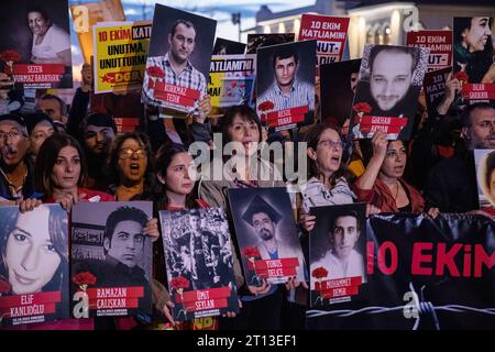 Istanbul, Turkey. 10th Oct, 2023. Demonstrators chant slogans, hold placards and portraits of the victims of the 2015 twin suicide bombings in Ankara, during a commemoration ceremony. Demonstrators gather at Kadikoy pier in Istanbul to attend a commemoration ceremony to pay tribute to the 104 victims of the twin bombings near Ankara train station on its 8th anniversary in Istanbul. Credit: SOPA Images Limited/Alamy Live News Stock Photo