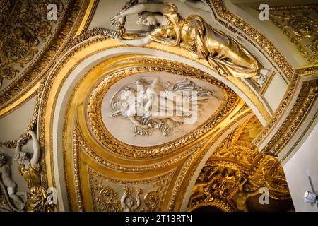 Ceiling art of Louvre museum. Image of artwork and painting on the ceiling at Louvre Museum, Paris, France. Louvre interior. Stock Photo