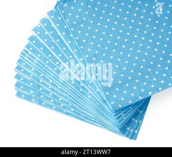 Stack of blue dotted paper napkins isolated on white Stock Photo