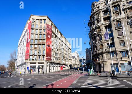 Bucharest, Romania, 2 January 2022: Modern buildings near Natiunile Unite Square (Piata Natiunile Unite) and bridge on Dambovita river and cloudy blue Stock Photo