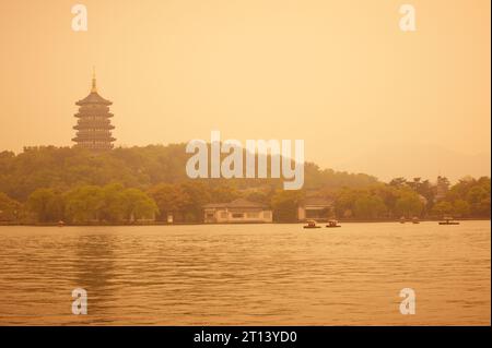 beautiful hangzhou west lake scenery, leifeng pagoda at sunset. Stock Photo