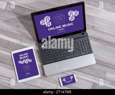 Online music concept shown on different information technology devices Stock Photo