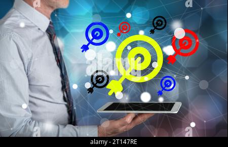 Target market concept above a tablet held by a man Stock Photo
