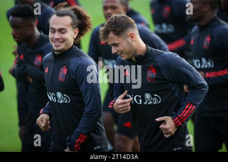 Tubize, Belgium. 11th Oct, 2023. Belgium's Arthur Theate and Belgium's Zinho Vanheusden pictured during a training session of the Belgian national soccer team Red Devils, at the Royal Belgian Football Association's training center, in Tubize, Wednesday 11 October 2023. The Red Devils are playing against Austria on Friday, match 6/8 in Group F of the Euro 2024 qualifications. BELGA PHOTO VIRGINIE LEFOUR Credit: Belga News Agency/Alamy Live News Stock Photo