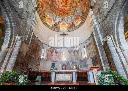 Painted presbytery ceiling and partly recovered frescos on medieval apse. Albenga Cathedral. Cathedral of St Michael Archangel in Italy. Stock Photo