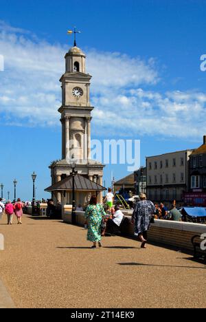 Clock tower on the promenade at Herne Bay, Kent, with weather vane on top Stock Photo