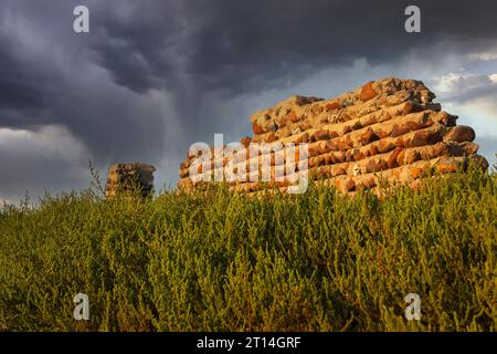 Mud wall with beautiful sky in the background Stock Photo
