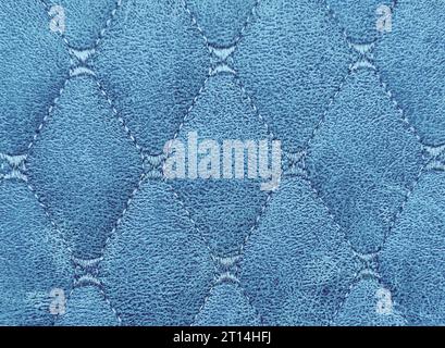 Leather texture. Part of perforated leather details. Leather texture background. Texture, artificial leather with diagonal stitching. Stock Photo