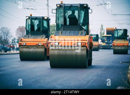 Close view on the road roller working on the new road construction site Stock Photo