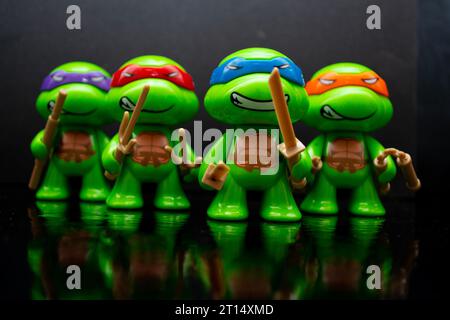 Teenage Mutant Ninja Turtles - Toys of turtles with black background Stock Photo