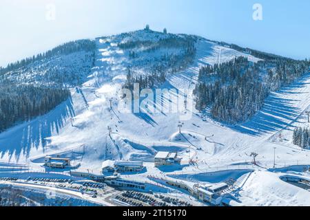The ski resort on the Big Arber in Bavaria Forest on a sunny winter day from above Stock Photo