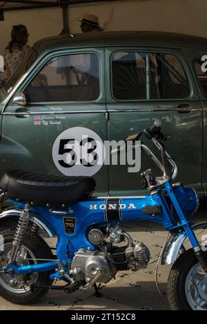 1960s Honda Monkey bike next to a 1953 Jowett Javelin at the BARC Revival Meeting 2023, Goodwood motor racing circuit, Chichester, West Sussex, UK Stock Photo