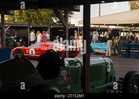 1934 ERA A-type R3A & 1965 Ford GT40 racing cars in the paddock at the BARC Revival Meeting 2023, Goodwood motor racing circuit, Chichester, UK Stock Photo