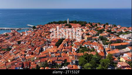 Summer aerial shot of Izola, historic fishing town in Slovenia, Europe. Stunning Adriatic Sea coastline view Stock Photo