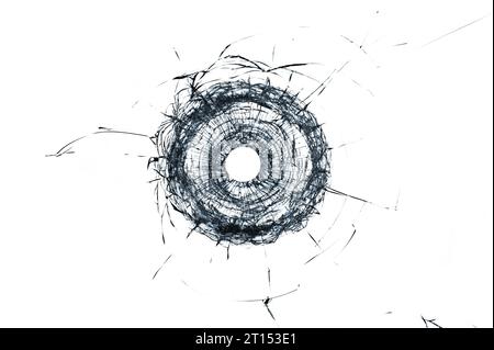 Broken glass single bullet hole in glass isolated on white background Stock Photo