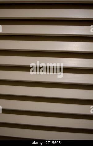 Wooden roller blind in an old house Stock Photo