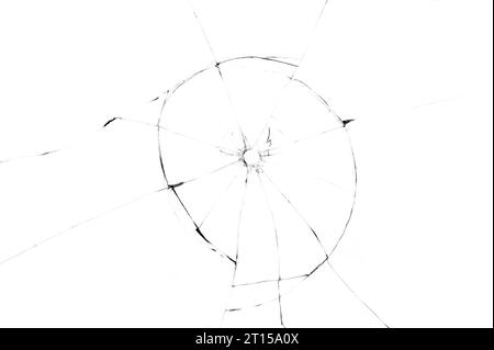 bullet hole in glass closeup on white background Stock Photo