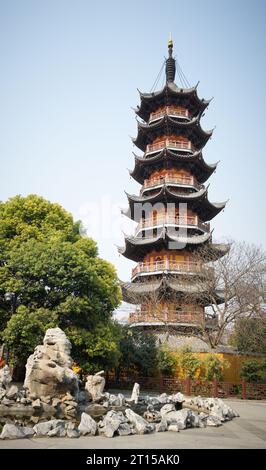 Old Longhua Pagoda against blue sky Shanghai, China Stock Photo