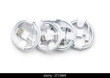White usb charging cables isolated on the white background. Stock Photo