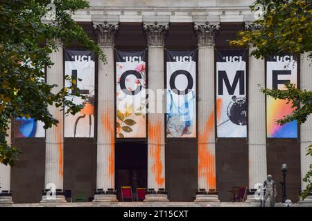 London, UK. 11th October 2023. The entrance at University College London (UCL) covered with orange paint. The action was part of a Just Stop Oil campaign by students targeting universities across the UK, demanding that the government stops new fossil fuel licences. Credit: Vuk Valcic/Alamy Live News Stock Photo