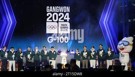 Seoul, South Korea. 11th Oct, 2023. Guests pose with the flame during the celebration in Seoul, South Korea, on Oct. 11, 2023, 100 days ahead of the opening of the 2024 Gangwon Winter Youth Olympic Games. The 2024 Winter Youth Olympics will be held in Gangwon from Jan. 19 to Feb. 1. Credit: Yao Qilin/Xinhua/Alamy Live News Stock Photo