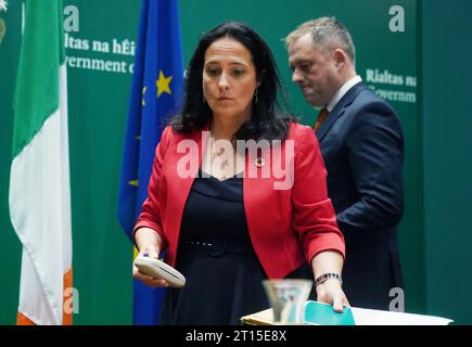 Minister for Tourism, Culture, Arts, Gaeltacht, Sport and Media Catherine Martin (left) and Minister of State at the department Thomas Byrne during a Budget 2024 press conference at Government Buildings in Dublin. Minister Martin has said she is withholding additional funding of 40 million euro from RTE until the broadcaster produces its strategic vision for reform. Picture date: Wednesday October 11, 2023. Stock Photo