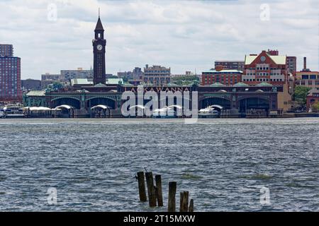 Lackawanna on the clock tower and ferry terminal are historical references to a railroad long gone; the terminal remains a busy commuter transit hub. Stock Photo