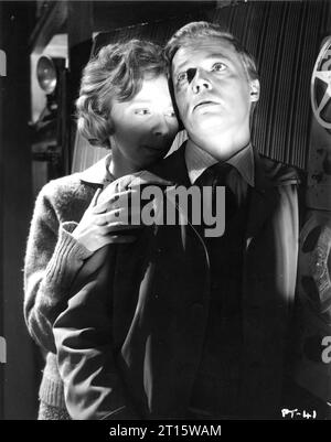 ANNA MASSEY and CARL BOEHM in a scene from PEEPING TOM 1960 Director MICHAEL POWELL Story LEO MARKS Cinematographer OTTO HELLER Anglo Amalgamated Film Distributors Stock Photo