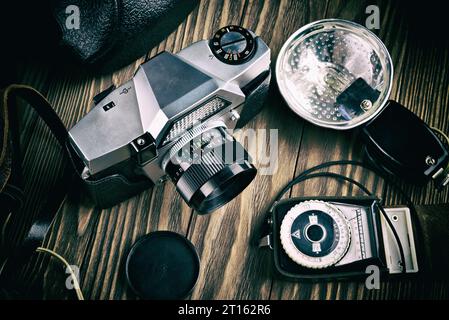 Moscow , RUSSIA - May 26, 2020: Old vintage russian soviet photo camera Kiev-10, flash Chaika and exposure meter Leningrad-4 Stock Photo