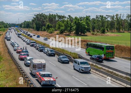 Traffic jam on a German freeway with emergency lane formed Stock Photo