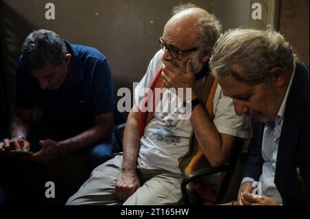 Reggio Calabria, Catanzaro, Italy. 11th Oct, 2023. Domenico Lucano supporters seen inside the court. The Court of Appeal of Reggio Calabria, guided by magistrate Elisabetta Palumbo, sentenced the former pro-migrant mayor Domenico Lucano to 1 year and six months of reclusion, with suspended pena. In October 2021, Lucano was sentenced by the Court of Locri to 13 years and two months of reclusion, for fraud and mismanagement of funds for migrants. (Credit Image: © Valeria Ferraro/ZUMA Press Wire) EDITORIAL USAGE ONLY! Not for Commercial USAGE! Stock Photo